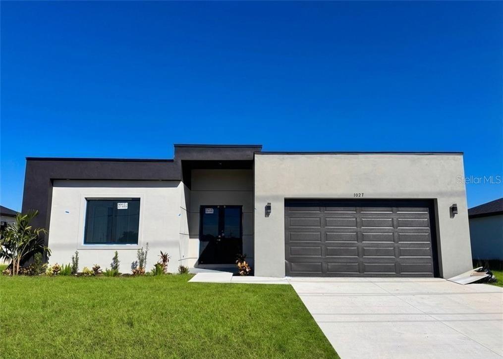 Photo of 1027 Kismet Parkway W, Cape Coral, FL 33993 (MLS # O6437430)