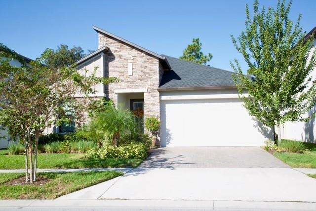 Welcome to this stunning pool home, perfectly located in one of the most desirable and convenient areas of Land O’ Lakes. Dive into your own oversized private heated salt generated chlorine pool, complete with water bubblers features, extra decking, LED lighting, and a durable screened enclosure—all overlooking breathtaking sunsets and a peaceful conservation backdrop. The home is surrounded by beautifully upgraded landscaping and features a full irrigation system in both the front and back yards.
This gorgeous three-bedroom, three-bath home with an office offers a smart, functional layout that feels both open and inviting. As you enter, you’re welcomed by a spacious bedroom with its own private bathroom, followed by wide hallways enhanced with modern upgraded lighting and elegant crown molding. The open office with French doors provides a perfect space for work or study, while the main living area opens up to a bright and airy great room seamlessly connecting the living, dining, and kitchen spaces.
The kitchen is a true showpiece, featuring a large island with beautiful finishes, stainless steel appliances, a built-in microwave and thermal wall oven, a modern stainless-steel exhaust fan, and a convenient kitchen water filter. The open-concept design is perfect for entertaining family and friends, while the spacious living areas are adorned with stylish ceiling fans and high-quality finishes throughout.
The master suite is a luxurious retreat with dual sinks, an oversized walk-in shower, and ample closet space. Each of the three bedrooms offers a functional layout and generous storage, ensuring comfort for every member of the household. Energy-efficient dual-pane windows provide peace of mind and long-term savings.
Living in Connerton means you’ll enjoy resort-style amenities, including walking trails, a state-of-the-art fitness center, tennis and pickleball courts, a clubhouse, and a variety of community events and activities for all ages. With top-rated schools nearby and every convenience just minutes away, this location truly has it all.
Why wait for new construction when this fully upgraded, move-in-ready home is waiting for you? Save time and money on post-purchase improvements and come see for yourself why this Land O’ Lakes gem is the perfect place to call home.