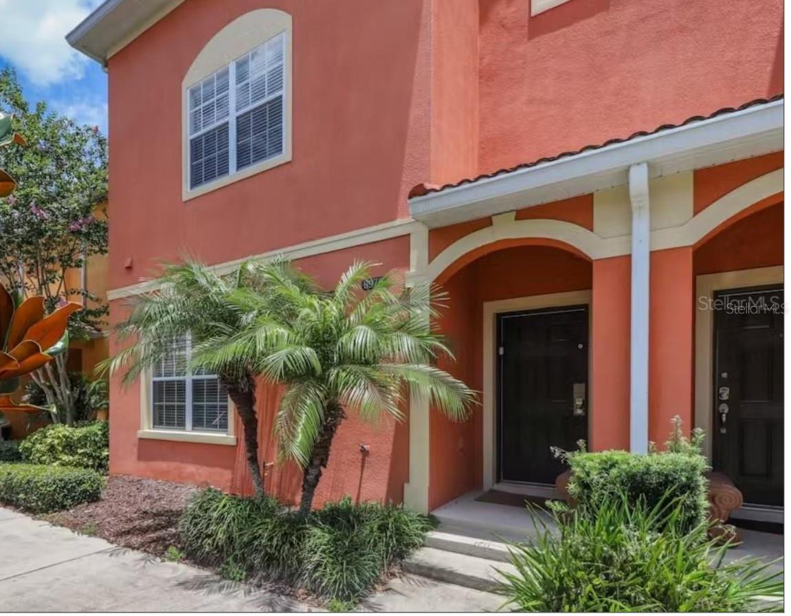 Gorgeous and fully furnished vacation home in Paradise Palms Resort, has a spacious layout, large bedroom downstairs with full bathroom, on-suite master bedroom upstairs, laundry room upstairs, spacious living room and dinning room area, granite countertops on kitchen and bathrooms, stainless steel appliances, large pool area with extended deck ideal for relaxing after a long day. Paradise Palms offers amenities that include pool, clubhouse, and fitness center. Minutes to major theme parks, shopping and dining.