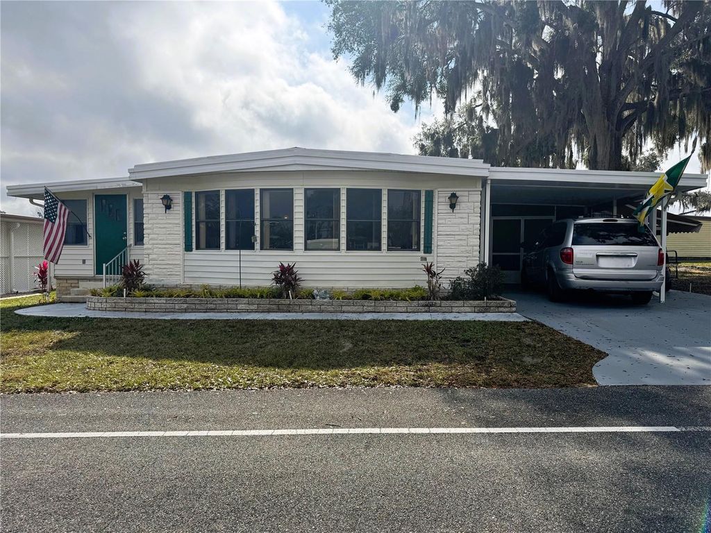 Photo of 407 Palo Verde Drive, Leesburg, FL 34748 (MLS # R4910498)