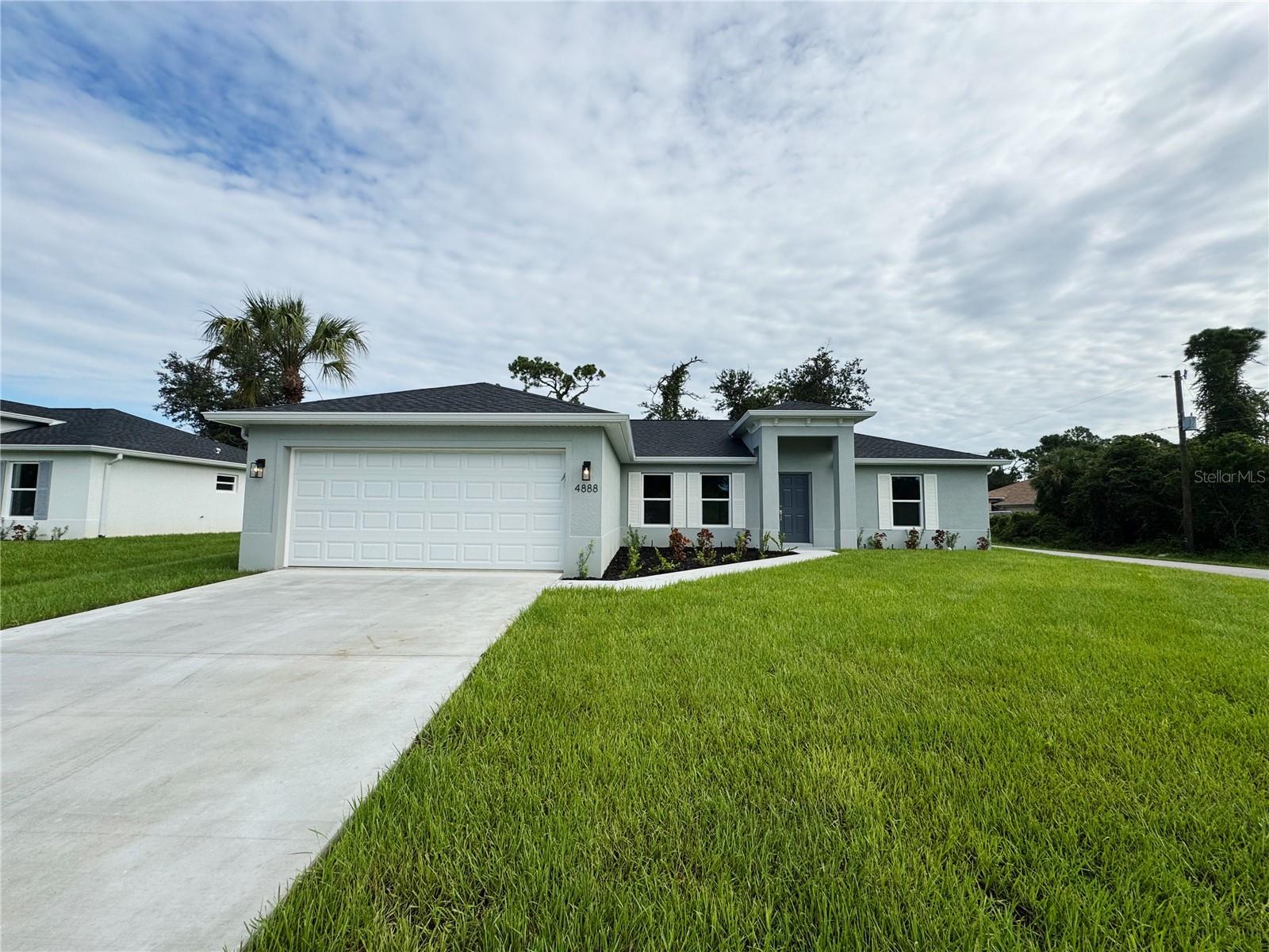 Beautiful New Construction Home Available Now on an Oversized, Corner Lot! Everything is Included and Everything is Upgraded! Starting with an open, split floor plan with vaulted ceilings, this home has Hurricane Impact, insulated, low e windows, full overlay cabinets, stainless steel kitchen appliances, quality stone countertops and window sills, porcelain tile throughout, 30-year shingles, 3 zone sprinkler system, screened lanai, brand name plumbing and electrical fixtures, fully sodded and landscaped. This home has been built to keep insurance, maintenance and utility costs low. Preferred lender is offering up to $1,500 in closing cost assistance! Take a tour through of one of our Beautiful Homes: https://youtu.be/SFsL-Aell24