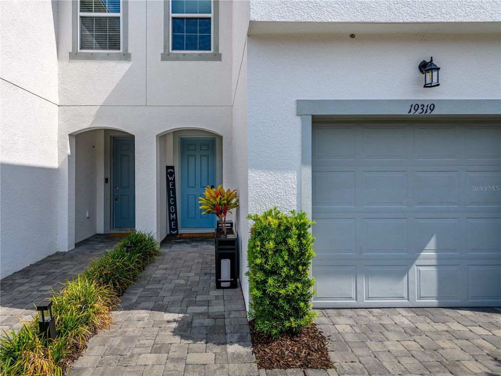 Photo of 19319 Blue Pond Drive #22, Lutz, FL 33558 (MLS # TB8522958)