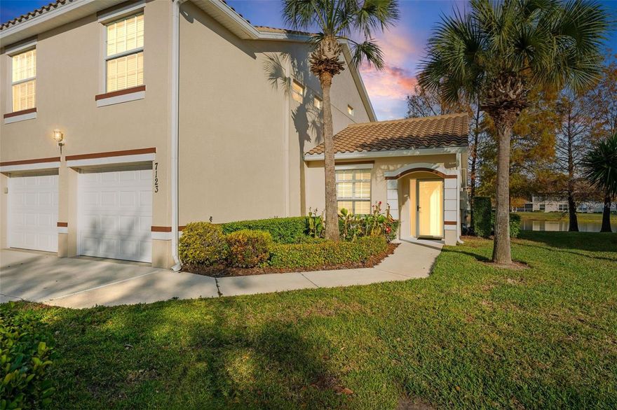 One or more photo(s) has been virtually staged. Welcome to 7123 Strand Circle, a beautifully maintained 2-bedroom, 2-bath condo with a 1-car garage, located in Cypress Strand a very desirable area of the Tara Golf Community in Bradenton, Florida. Cypress Strand offers residents access to its own community pool, clubhouse, and tennis courts, while golf membership remains optional, allowing you to enjoy the lifestyle without mandatory fees. This end unit provides extra privacy and abundant natural light, enhanced by vaulted ceilings in the great room that create an open, airy feel. Tile flooring flows throughout the main living areas, while brand-new carpeting adds comfort to both bedrooms. Sliding glass doors open to a covered and screened lanai with tranquil pond views, offering a peaceful outdoor retreat ideal for morning coffee or evening relaxation. The kitchen is thoughtfully designed with granite countertops, a pass-through breakfast bar to the dining area, and extra cabinetry and counter space, making it both functional and perfect for entertaining. The spacious primary suite features a walk-in closet, linen closet, dual sinks, and an updated walk-in shower with a frameless glass enclosure, while the guest bedroom and second bath provide comfortable accommodations for visitors. Additional features and updates include hurricane shutters, plantation shutters, a storm door, and sliding glass doors leading to the lanai, along with numerous major improvements such as a NEW AC system installed in February 2023, Washer and Dryer added in July 2023, a NEW ROOF completed in 2024, Fresh Exterior Paint in 2025, and BRAND NEW Carpeting installed in December 2025—all contributing to a clean, truly move-in-ready home.  Tara is centrally located with easy access to I-75, making commuting and travel throughout the Sarasota-Manatee area effortless. Residents enjoy proximity to shopping, dining, and entertainment at University Town Center (UTC), downtown Bradenton, and nearby Lakewood Ranch. Dining options range from casual favorites to upscale restaurants, while entertainment includes theaters, live music venues, and local events year-round. World-famous Gulf Coast beaches are just a short drive away, including Anna Maria Island, Bradenton Beach, and Coquina Beach, known for their sugar-sand shores, stunning sunsets, boating, and waterfront dining. Golfers, walkers, and cyclists will appreciate the community’s scenic surroundings and optional access to Tara’s golf amenities. This condo offers the perfect balance of comfort, convenience, and Florida lifestyle living—whether you’re seeking a full-time residence, seasonal retreat, or low-maintenance investment opportunity.