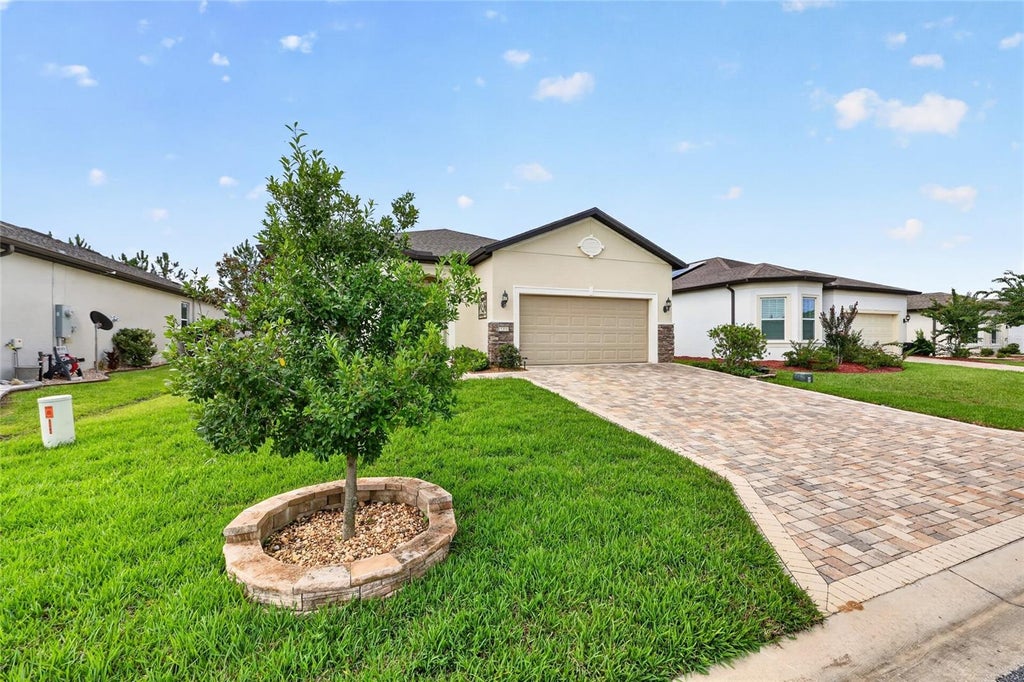Photo of 9304 SW 56th Loop, Ocala, FL 34481 (MLS # OM731430)