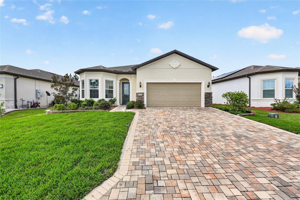 Photo of 9304 SW 56th Loop, Ocala, FL 34481 (MLS # OM731430)