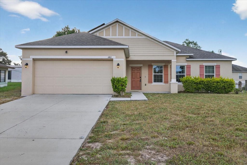 Photo of 1411 Mariner Boulevard, Spring Hill, FL 34609 (MLS # TB8430273)