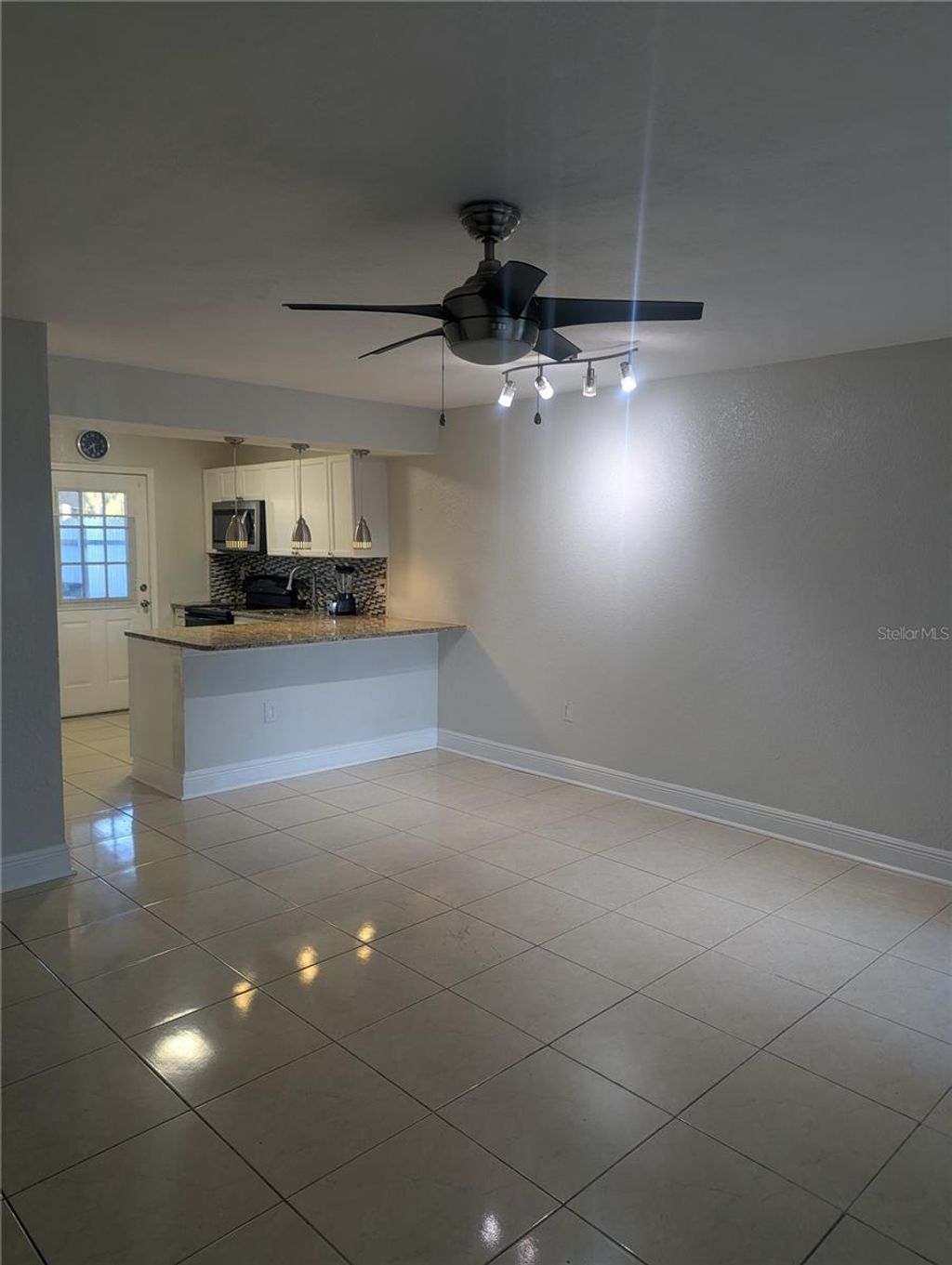 Photo of 14509 Seaford Cir #102, Tampa, FL 33613 (MLS # TB8473489)