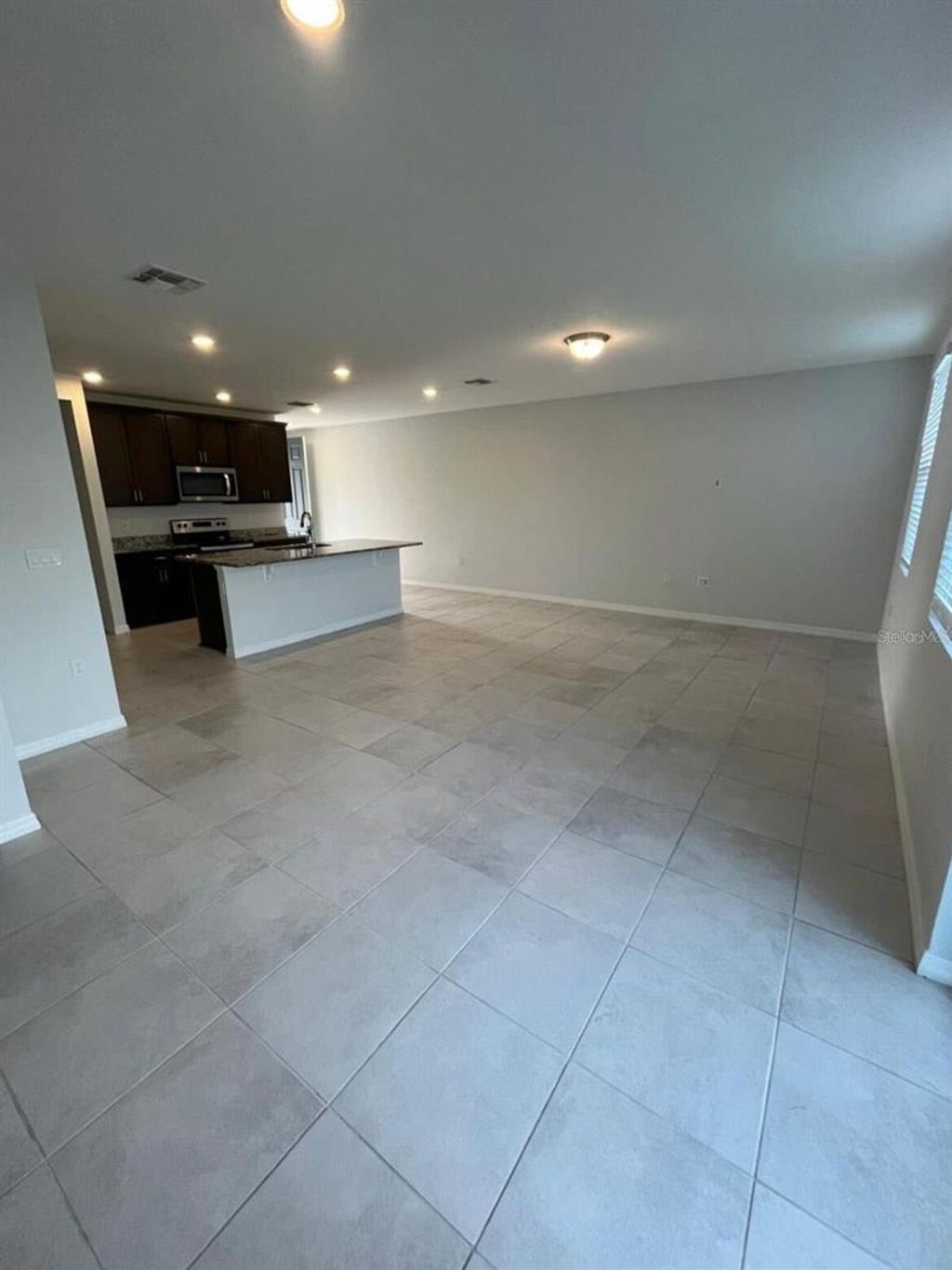 Photo of 4474 Burrowing Owl Loop, Saint Cloud, FL 34772 (MLS # O6388162)