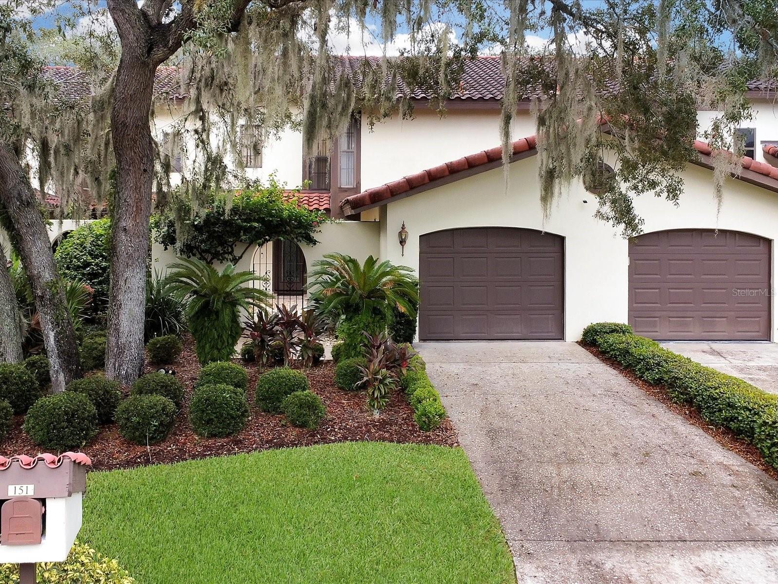 ***This home is a stunner from the top to bottom*** I am not even kidding. Every inch is impeccable. It starts with your walk up the gated front courtyard entry to the gorgeous front door with its matching sidelight and continues as you enter this home. Once inside your eyes will immediately feast on the Hickory engineered hardwood flooring that runs throughout the first floor living area and primary bedroom and right on up the stairs to the second floor bedroom and loft area. Once back downstairs you'll not miss the back lanai that is adorned with Chattahiichee stone. ***Air Conditioning was replaced in February of 2020*** Roof is barrel tile which THIS owner has it professionally inspected yearly as part of the maintainence ritual. Water bills around $35/month. Electric bill averages $143/month which makes this an affordable place to call home. Don't forget the amenites when you are a resident of Club Estates: All outside building maintenance is done for you which includes exterior painting. Your lawn will mowed and trees kept up plus it will get watered due to the inground sprinklers. Full access to the clubhouse on property as well as the heated pool, spa, sauna and fitness gym. You can also have casual meetings and or family gatherings in the clubhouse or pool deck area. So I ask ??? What's stopping you !! Make that call, visit this beautiful home --- Fall in LOVE ---- Take that step !! This could all be yours !! Ummmm......Did I mention it is FURNISHED !!! (Dining room table/chairs/buffett excluded)