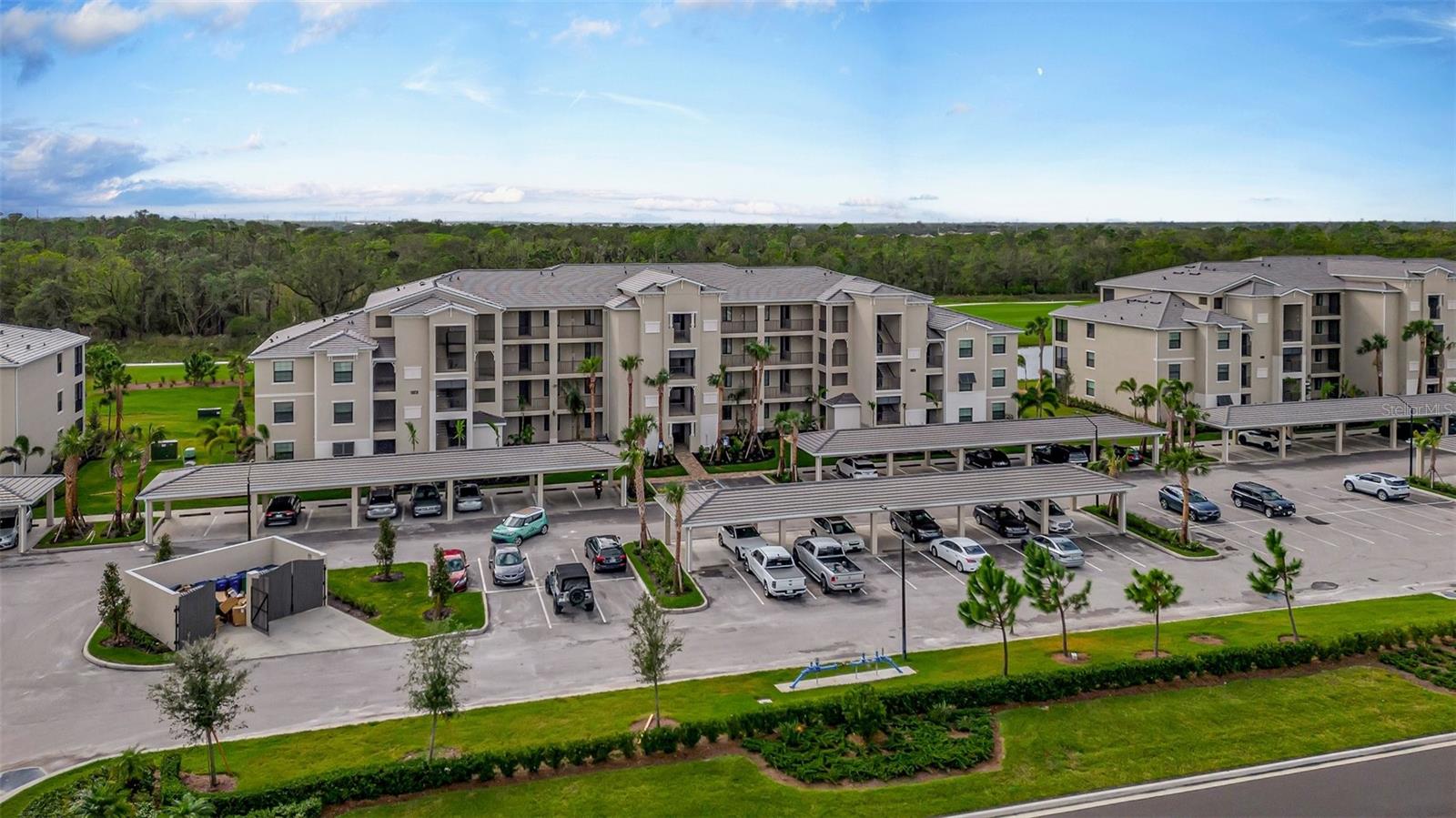 Why rent when you can buy!! This TURNKEY furnished, stunning, first floor condo, is located right on the golf course with beautiful pond views, in a community with tons of amenities. The kitchen is perfect for entertaining and offers quartz countertops, island, chic modern cabinets, and stainless steel appliances. Open living and dining areas are perfect for gatherings. Enjoy the views of the golf course, sunrise, and sunset from your spacious screened in lanai. Lakewood National offers many first-class amenities to include resort-style pools, outdoor tiki restaurant, state-of-the-art fitness center, two golf courses designed by Arnold Palmer, clubhouse with full-service spa, tennis courts, bocce ball court, and pickleball courts. In 2023 the Grand Clubhouse will be completed to include both fine and casual dining options as well as banquet facilities. Short distance to Lakewood Ranch's downtown district with lots of shops and restaurants. Don't delay, book your showing today!!