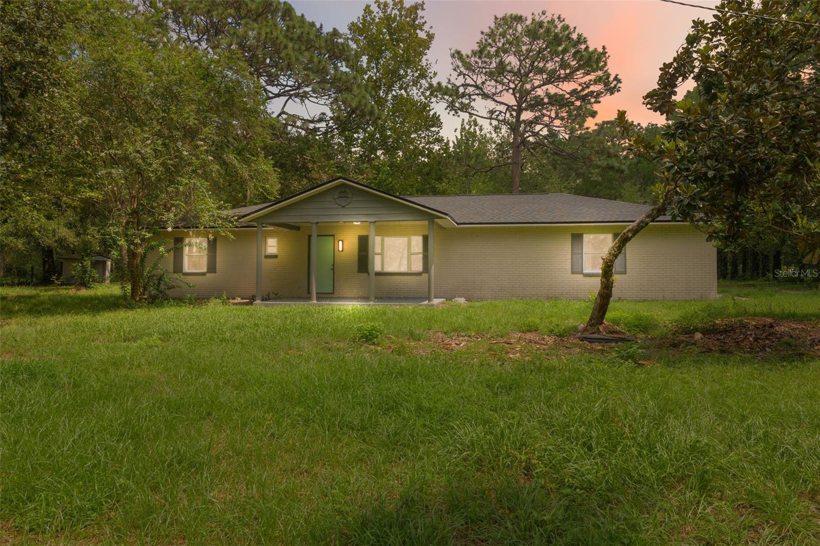 Beautifully renovated and spacious, this property features a 3-bedroom main house and a detached 2-bedroom in-law suite on a 1.364-acre lot. The main house offers 1,876 heated sqft with 3 bedrooms, 2 bathrooms, new flooring throughout, and a utility room with washer and dryer hookups. The detached in-law suite adds 616 sqft with 2 bedrooms and 1 bathroom, and has also been fully updated.
Both homes include new laminate flooring, fresh paint, modernized bathrooms, and updated kitchens with recessed lighting, stainless steel appliances, new cabinets, and quartz countertops. A private gated driveway leads to the covered front porch, while the expansive lot features a private shed and plenty of outdoor space to enjoy.
The property is located outside the 1% and 0.2% chance floodplains for added peace of mind.