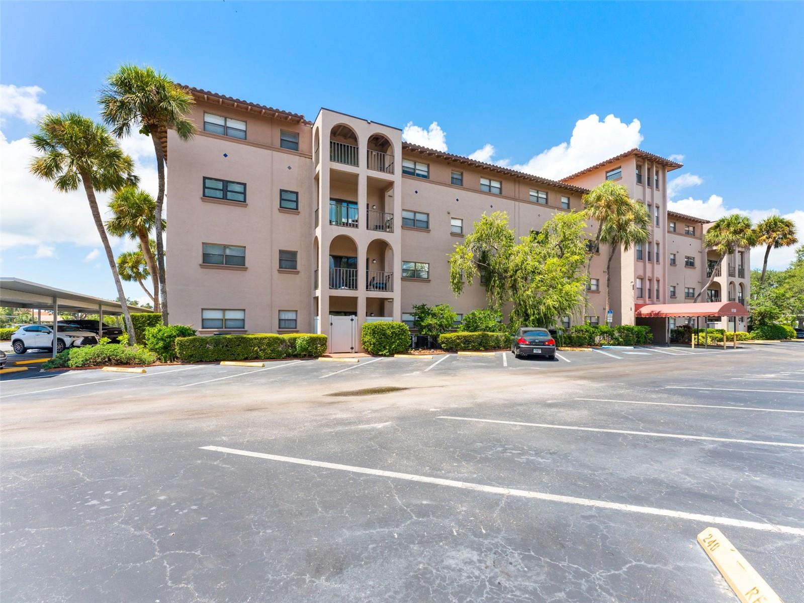 Welcome to this bright and spacious 2-bedroom, 2-bath condo with a versatile study in one of South Pasadena's most sought- after resort-style communities. This rare corner unit is one of only eight in both buildings and offers added privacy and larger windows that flood the living areas and bedrooms with natural light. Inside, you'll find laminate flooring in the bedrooms and living room, tile in the kitchen and an open-concept living and dining room combo. The bonus room/ study provides a flexible space ideal for a home office, guest room, or creative retreat. The kitchen features oak cabinetry, newer appliances, a dishwasher(2020), Fridge and stovetop (2020), and a 2-year AC system. The unit also includes an inside washer/ dryer and a water heater that is less than 2 years old. A climate-controlled storage room is conveniently located just steps from the front door. The community offers 2 designated parking spaces with the condo, a beautifully landscaped courtyard with pergola, a sparkling pool and pool deck, and plenty of space for lounging, cookouts, and entertaining. Additional amenities include an on-site maintenance personnel and laundry facilities. Located directly across the street from Stetson College of Law and the Pasadena Yacht and Country Club, this condo is just a 10-minute drive to St.Pete Beach or downtown St.Petersburg, with easy access to -275 and only 25 minutes to Tampa International Airport. This is Florida living at its best- comfortable, convenient, and carefree.