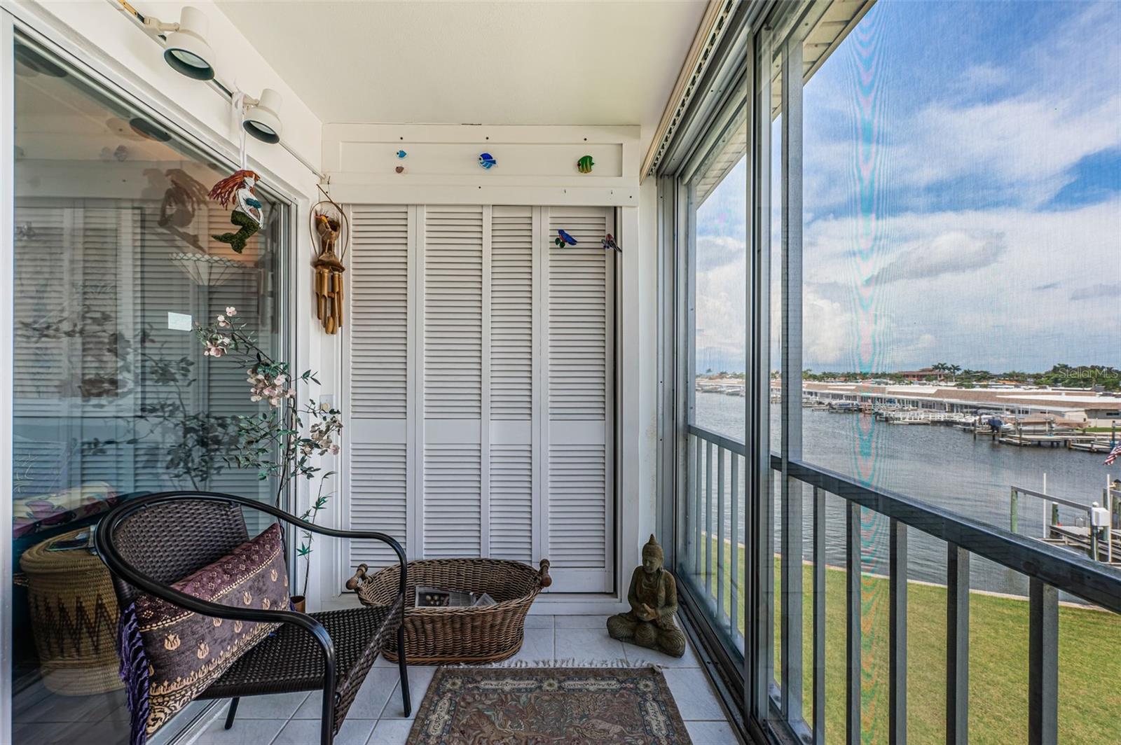 AFFORDABLE WATERFRONT/WATERVIEW LIVING! Rare opportunity to own one of these units at Boca Ciega Point, a 55+ Boating Community. Includes covered carport with a stunning intracoastal view. Well maintained TOP floor unit with a NEW ROOF and a 2 year old A/C. Condo is light and bright with living/dining combo. Floors are durable laminate that looks like wood and ceramic tile. Spacious bedrooms with a water view from the master suite. Adequate storage throughout the unit and additional storage for outdoor items/holiday items etc. Newly screened porch with intracoastal view. Gated community. Community pools, tennis, pickleball, shuffleboard and recreation. A newly updated fitness center, community dock for boat pick-up/drop-off, and a kayak loft add to the appeal for those looking to paddle to the Intracoastal Waterway. Don't miss this one! Won't last. Milestone study complete and available to review. No pending assessments. Appointment only.