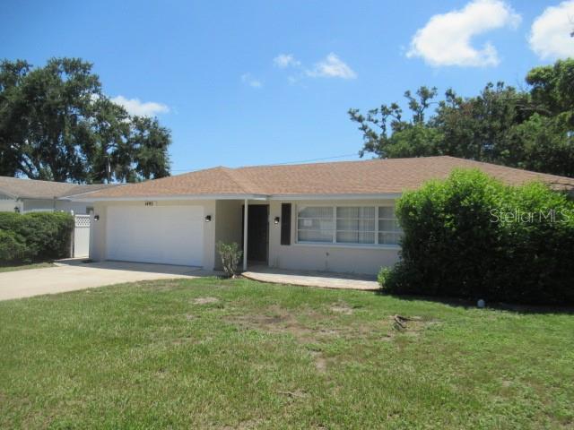 Welcome to 1495 Lakeside Drive, a charming Dunedin home, ideally located just minutes from everything that makes this coastal town so amazing. Featuring 2 bedrooms, 2 bathrooms, and a 2-car garage, this residence offers a spacious and functional layout designed for comfortable living. Recent improvements include a brand-new roof, fresh interior and exterior paint, a new electric panel, new vinyl plank flooring in the main living areas, and new carpet in the bedrooms—offering a move-in ready feel while still leaving room for your personal touches.
Inside, you’ll find a split-bedroom floor plan that provides privacy and flexibility. The primary suite includes an ensuite bathroom, while the guest bedroom is conveniently located near the hall bath. The living room flows into the dining area, and the kitchen is well appointed with stone countertops and overlooks a generous family room, making it a great space for everyday living or entertaining. French doors open to the backyard, where a deck invites you to unwind and enjoy the outdoors. A bonus area just off the main living space could serve as a home office, craft room, or reading nook. The laundry area is located in the garage for added convenience.
The fully fenced backyard offers plenty of room to customize—whether you envision a gazebo, spa, raised garden beds, or a workshop or storage shed, there’s ample space to make it your own private retreat.
Located just 2 miles from vibrant Downtown Dunedin, and only 15 minutes to the sandy shores of Honeymoon Island and award-winning Gulf Coast beaches, this home is close to waterfront parks, local boutiques, dining, and all the charm Dunedin is known for.
All information is believed to be accurate but is not guaranteed. Buyers and agents to verify all information pertinent to their purchase decision.
