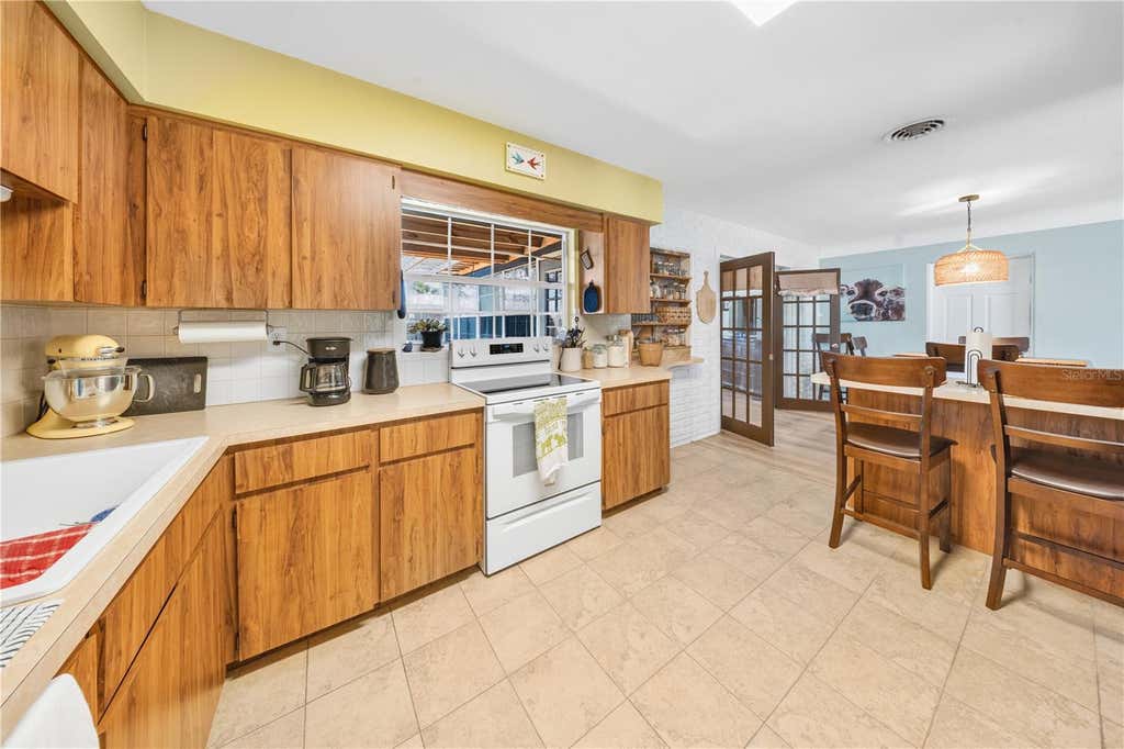 Photo of 5920 49th Avenue N, Kenneth City, FL 33709 (MLS # TB8539917)