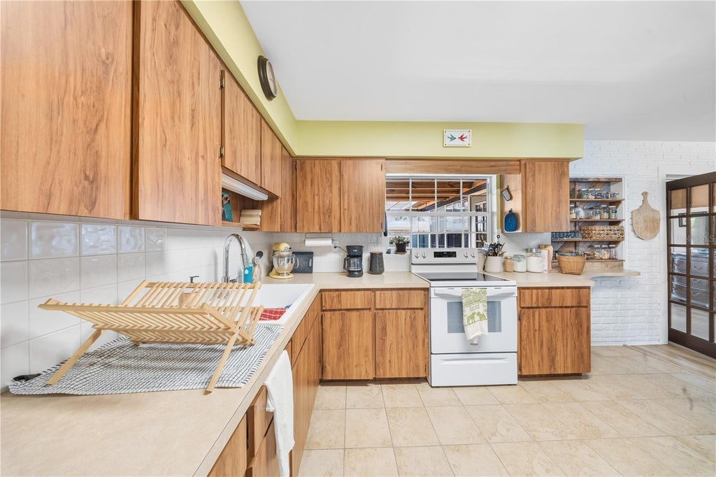 Photo of 5920 49th Avenue N, Kenneth City, FL 33709 (MLS # TB8539917)