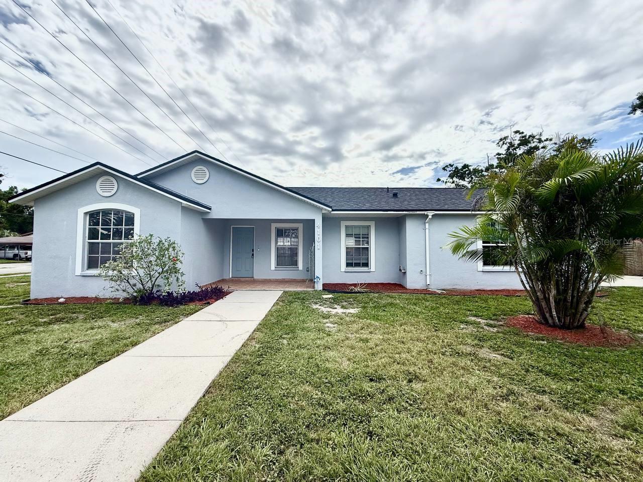 Discover this charming 3-bedroom, 2-bathroom home in Tampa, featuring a spacious one-car garage and a huge driveway that offers plenty of room for parking, storage, and all your space needs. Inside, you'll find wood laminate flooring throughout, creating a warm and stylish feel. The open and airy floorplan is complemented by ceiling fans in every room, ensuring year-round comfort and a welcoming atmosphere. The kitchen is a true standout, equipped with a sleek white appliance package and an abundance of cabinetry, offering plenty of storage and prep space for all your cooking needs. For your convenience, the home also includes a washer and dryer, making laundry day a breeze. With its modern features and generous space, this home offers everything you need for comfortable living in Tampa. In addition to the advertised base rent, all residents are enrolled in the Resident Benefits Package (RBP) for $50.00/month which includes HVAC air filter delivery, credit building to help boost your credit score with timely rent payments, utility concierge service making utility connection a breeze during your move-in, and much more! More details upon application. Pets welcome, no aggressive breeds. Vacant and Available Now!