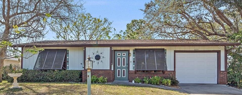 STOP AND TAKE A LOOK at this charming 2/2/1! A well maintained 2-bedroom, 2-bathroom, 1-car garage home in a centralized location. Minutes from dining, shopping, the North Port library, Warm Mineral Springs, medical clinics, banks, a dog park, and not far from Wellen Park. Plus, both Venice and Englewood beaches are within 25 minutes. This home is designed for both style and functionality and features an updated kitchen with new cabinets, new stainless-steel appliances and granite countertops. Take your dog and step outside to enjoy a large, fenced yard with lots of mature trees, bushes and two bird baths that brings birds and wildlife to the yard. A large lanai provides a serene outdoor space for relaxation or entertaining. There’s also a convenient shed for all your storage needs. Recent upgrades include a newer roof (2021) and garage door (2020) and a brand-new water heater (2024), ensuring peace of mind for years to come. This property is connected to public water and sewer and is in a No Flood Zone making it a safe and secure place to call home. A peaceful neighborhood with great neighbors. Make this comfortable home your full-time residence or a winter retreat, don’t miss out on this fantastic opportunity to live the Florida dream! Schedule a viewing today!