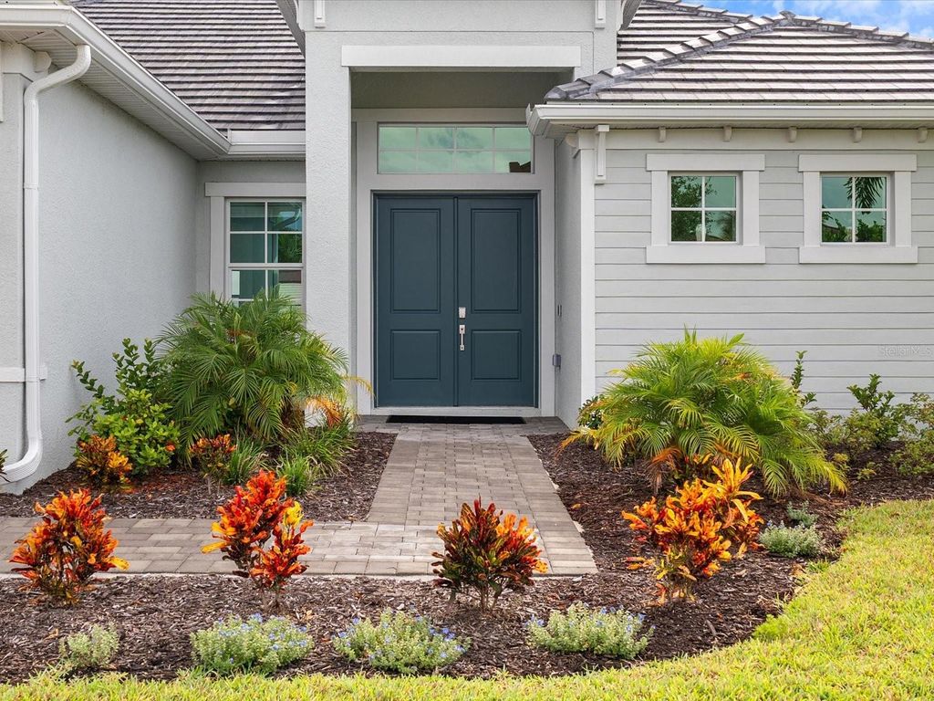 Photo of 8604 Shore Lake Drive, Englewood, FL 34224 (MLS # C7505304)