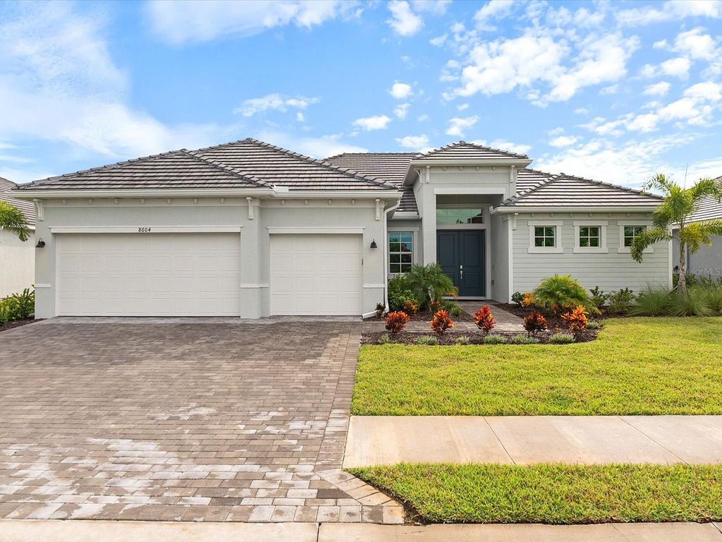 Photo of 8604 Shore Lake Drive, Englewood, FL 34224 (MLS # C7505304)
