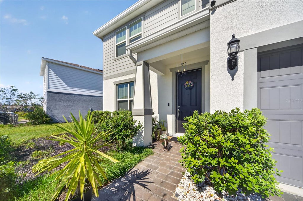 Photo of 17301 Cagan Crossings Boulevard, Clermont, FL 34714 (MLS # O6451297)