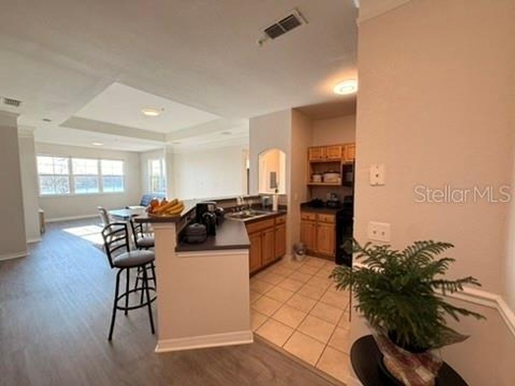 Photo of 3428 Soho Street #308, Orlando, FL 32835 (MLS # O6378563)