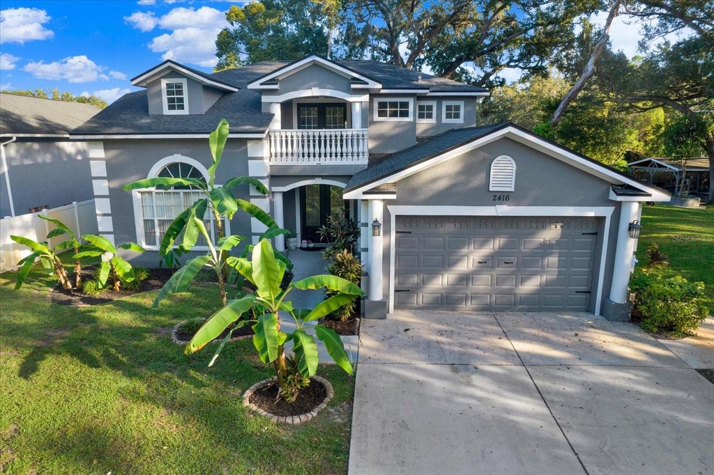 Photo of 2416 Burlwood Drive, Lutz, FL 33549 (MLS # TB8561037)
