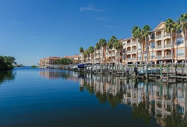 Experience the pinnacle of waterfront resort-style living at an unbeatable price in Florida! This exclusive home is a rare gem, allowing you to live every day like you're on vacation. Step onto your private balcony and be greeted by breathtaking views, fresh saltwater air, and the incredible sight of dolphins, manatees, and fish jumping right before your eyes – a true paradise for ocean and boat enthusiasts! You'll enjoy not one, but two separate waterfront balcony areas for ultimate relaxation and wildlife viewing, and for aquatic adventures, an affordable boat slip lease is available for just $220/month.
This meticulously maintained turn-key home, built in 1999, offers move-in-ready comfort and style. Inside, discover modern conveniences including brand new washer and dryer, a walk in shower, and a new water heater. The stylish kitchen boasts stainless steel appliances, granite countertops, and a breakfast bar, while the entire space feels fresh with recently painted interiors and a stylish blend of luxury vinyl and tile flooring. The spacious bedroom features a large walk-in closet, and you're conveniently located just steps away from the building elevator.
Nestled within a secure gated community, this home unlocks an exceptional resort-style lifestyle. Enjoy a large swimming pool with stunning canal views, take leisurely strolls along the scenic walking trail, let your furry friends play freely in the off-leash dog park, host gatherings in the spacious clubhouse, utilize the convenient car wash area, and stay fit in the well-equipped gym, all while enjoying views of the sparkling water.
Conveniently situated just off the Gandy Bridge, this prime location puts you close to airports, top-notch shopping, a diverse array of restaurants, and abundant entertainment options – from sports and music to theatre, ensuring there's always something exciting to do.
Don't miss this incredible opportunity to own your slice of Florida paradise and live the vacation lifestyle year-round!