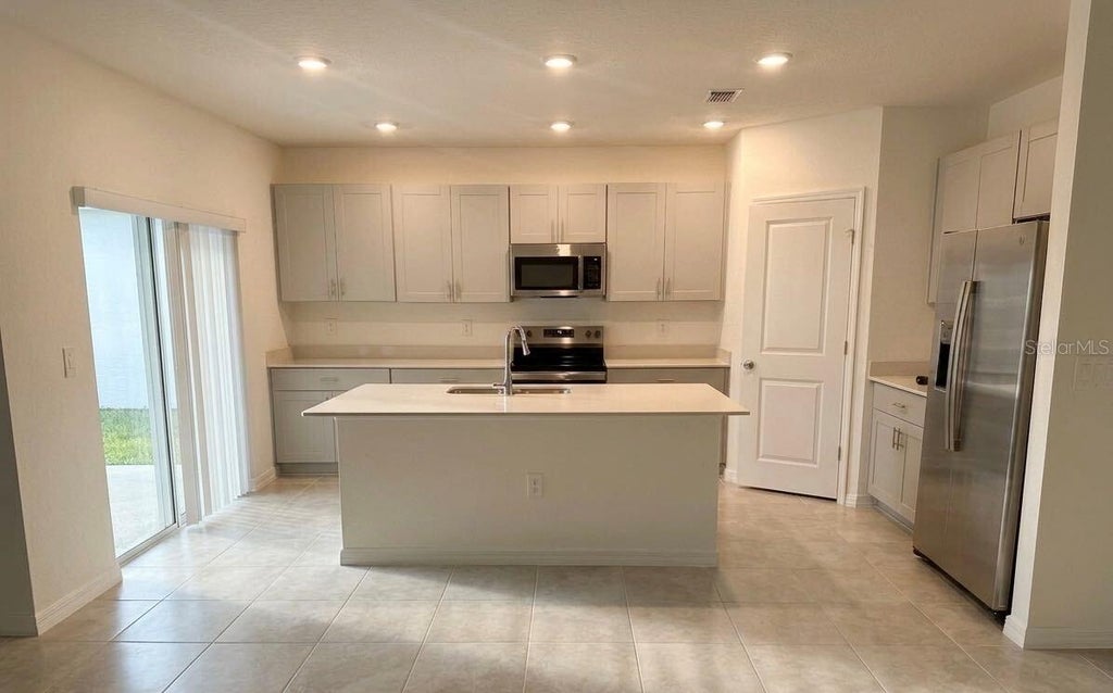 Photo of 5443 Isla Saona Drive, Kissimmee, FL 34758 (MLS # O6429621)