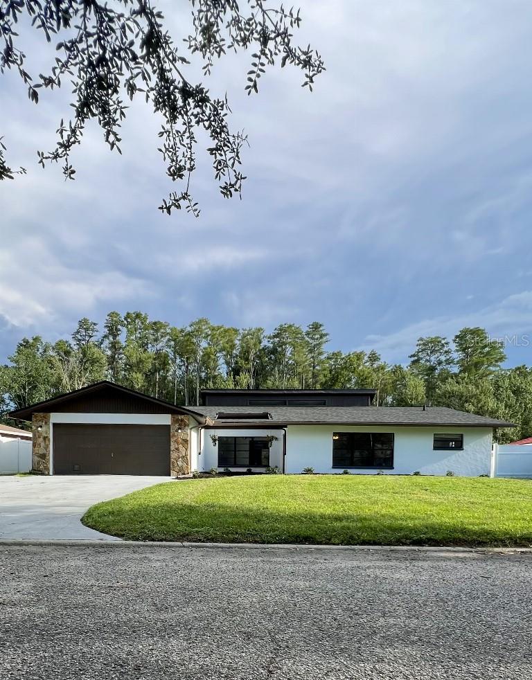This Estate on Debbie Lane offers a spacious, low-maintenance home with a private, lush green backyard, pool, and no monthly HOA obligations—ideal for value-minded families. Its location combines peace and privacy with ease of access to retail and recreation. With a large and well-equipped interior layout plus recent major updates, the home is move-in ready and positioned in a highly desirable zone near both suburban amenities and Tampa cultural destinations.