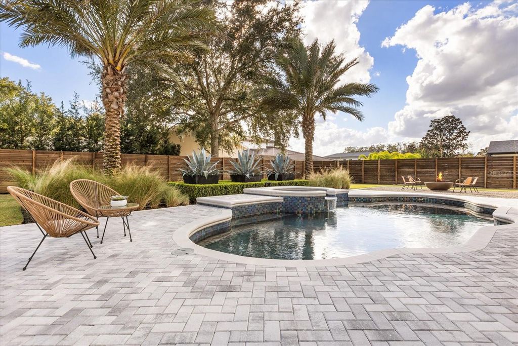 Photo of 948 Poinciana Lane, Winter Park, FL 32789 (MLS # O6372165)