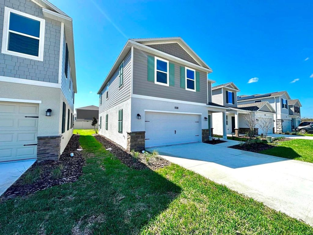 Photo of 3874 Amers Loop, Haines City, FL 33844 (MLS # O6416957)