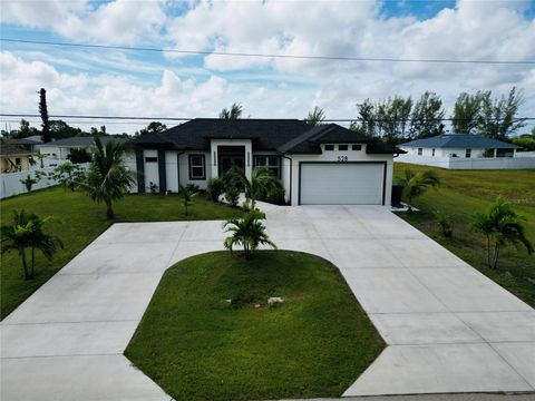 Photo of 528 Jacaranda Parkway E, Cape Coral, FL 33909 (MLS # A4668942) Photo of 528 Jacaranda Parkway E, Cape Coral, FL 33909 (MLS # A4668942)