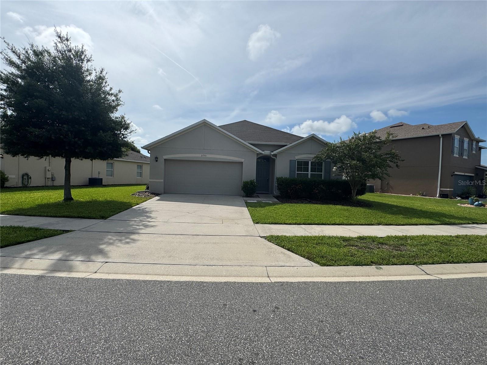Welcome to the beautiful Sabal Lakes community! This all-concrete block constructed Cali model offers a spacious one-story layout designed for modern living. Step inside to discover an open concept kitchen that seamlessly overlooks the inviting living area and dining room, perfect for entertaining family and friends. The well-appointed kitchen features black appliances, a generous island for meal prep, and a spacious pantry that provides ample storage for all your culinary needs. The private primary suite, located at the rear of the home, boasts a luxurious en-suite bathroom with a double sink vanity, a spacious shower, and a sizeable walk-in closet. Two additional bedrooms at the front of the home share a second full bathroom, while a versatile fourth bedroom can serve as an office, den, nursery, or guest room—perfect for accommodating your lifestyle. Enjoy outdoor living with sliders that open to a covered lanai, overlooking a large partially fenced backyard ensuring your tranquility and privacy. For the active lifestyle, Sabal Lakes provides amenities such as nature trails and a community pool and the New Smyrna Multi-Use Trail is just minutes away. Located near I-95, schools, shopping, and medical facilities, and only 15 minutes from the beach, you'll enjoy easy access to everything New Smyrna Beach has to offer. The landlord covers yard maintenance, weed control, and exterior pest control, while tenants are responsible for electric, water, trash, and sewer—all on a single bill. Prospective tenants will need to provide a background screening, HOA application, and the rental requires first month's rent and security deposit. (There is a $59 one-time application fee per adult, $150 per household HOA application, a security deposit of one month’s rent, and applicable fees for pets-$200 non-refundable pet deposit + $25/month per pet. Applicants must have a combined monthly income of at least 2.7x monthly rent). Hurry and secure this fantastic rental opportunity—it won't last long! Please note, this is a non-smoking property. Don’t miss your chance to live in this beautiful home!