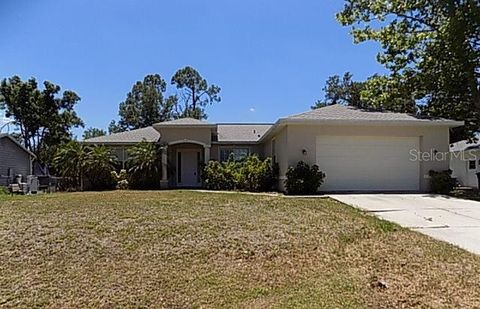 Photo of 3089 Tishman Avenue, North Port, FL 34286 (MLS # A4693579)