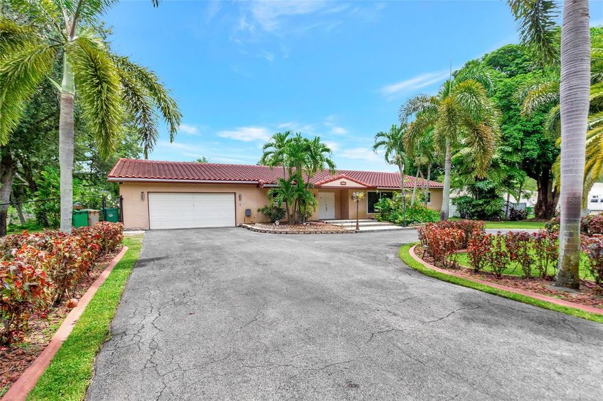 Welcome to your dream home! Here you will find over 4000 sq ft of luxury living, with a spacious 3 bedroom 2.5 bathroom, perfect for entertaining and hosting special events. Bring your horses and all your toys there is no HOA! You'll love the oversized pool complete with a 2500 sq ft brick patio. property sits on 1 1/4 acres. The Primary bedroom is your own private oasis has a luxury bathroom and amazing walk in closet. Chefs kitchen over looks the pool. Can easily convert formal living room to 2 more bedrooms.
The 2 story workshop/barn is great for anyone looking for space to work on projects or hobbies, plenty of storage. You can convert part of the storage for stables
some highlights washer & dryer hookups, tankless water heater, reverse osmosis system for whole house, whole house generator. Full property sprinkler system. All windows and front door are hurricane impact.