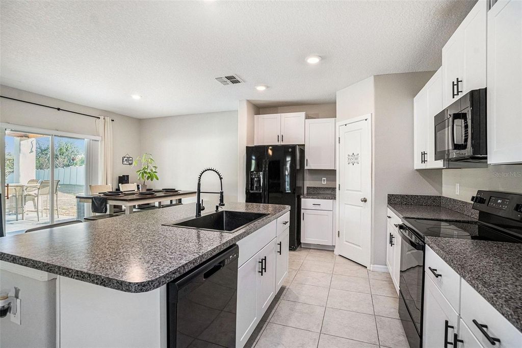 Photo of 5067 Sable Chime Drive, Wimauma, FL 33598 (MLS # TB8468013)