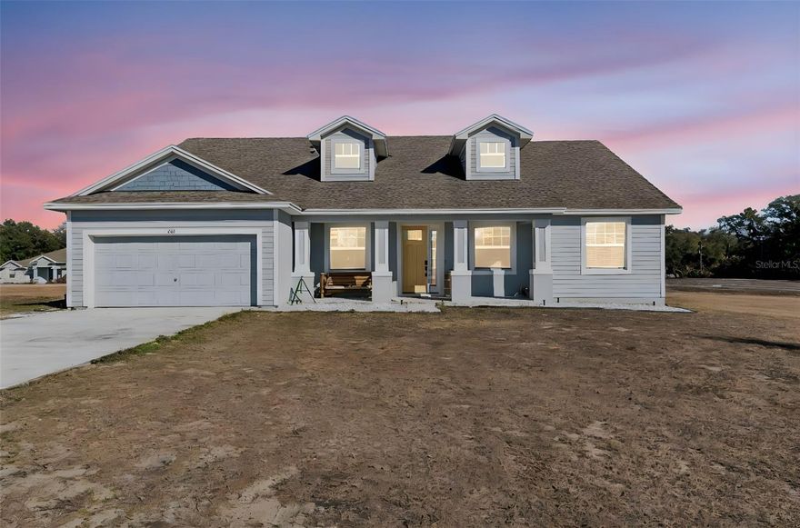 Welcome to this stunning Southern style home built in 2021, offering 4 bedrooms, 3 bathrooms, 2 car garage, and 2,427 heated square feet of thoughtfully designed living space on a massive 1.16 acre lot. With no HOA, no CDD, and located outside of a flood zone, this property offers space, privacy, and freedom rarely found.
As you enter the home, you’re welcomed by a beautiful dedicated office space on the right and a spacious formal dining area on the left, setting the tone for both functionality and elegance. The home features LVP flooring throughout most of the living areas, with carpeted bedrooms providing added comfort.
The open concept living, dining, and kitchen area is ideal for entertaining. The kitchen is exceptionally appointed with granite countertops, a stylish backsplash, 42 inch soft close cabinets, and top of the line Samsung appliances, including a dishwasher, built in microwave, built in oven, Samsung glass cooktop, and a stainless steel chimney style Samsung hood.
All bathrooms are finished with granite countertops and soft close cabinetry. The primary suite offers a true retreat with a spacious shower, a garden tub, and a massive walk-in closet. Secondary bedrooms feature built in closets, providing ample storage throughout the home.
Additional highlights include double pane windows throughout, a Samsung washer and dryer that can be operated through a smart app, drain field system, and biometrics locks - security system. Step outside to enjoy the covered lanai and beautiful pool, perfect for family gatherings, grilling, and relaxing while overlooking your expansive property.
Conveniently located near Winter Haven and Lakeland, and ideally situated between Tampa and Orlando, this home offers easy access to Walmart, Publix, nearby shopping centers, multiple dining and fast food options, and hospitals, making everyday living both simple and convenient.