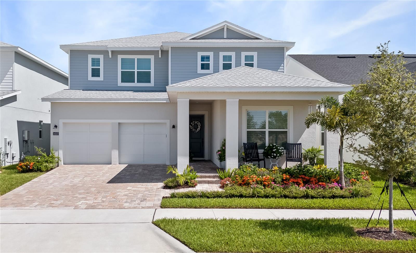 Experience refined luxury in the newer Toll Brothers masterpiece-The Griffin model-nestled in Westhaven at Ovation in Winter Garden's sought-after Horizon West. Spanning over 4000 sq ft, this thoughtfully designed home features 5 spacious bedrooms. 5 bathrooms, a versatile loft, and a dedicated office/media room. As you enter the expansive foyer, there is a formal dining room. The open floor concept layout is anchored by a Gourmet Kitchen boasting a top-tier 6-burner gas range, floor-to-ceiling cabinetry, cut marble tile backsplash, and stone countertops. A large island with a designer sink, walk-through custom butler's pantry, and expansive walk-in pantry complete this chef's dream. Retreat to the spa-inspired primary suite. Enjoy upscale touches, like Plantation shutters on all windows and Premium Design Studio upgrades throughout. Enjoy outdoor time on the screened-in Lanai. Additional highlights: Wide Garage, Gas tankless water heater. Energy Efficient Construction. Zoned for Top-Rated A Schools. Future amenities in the community include a Resort Pool, Fitness Center, Clubhouse, and Lakeside Lounge. Playground down the street. Minutes from Hamlin Town Center offers Publix, Walmart, Movie Theatre, Urbin Air Adventure Park, Ford’s Garage, and French Café, to name a few. Close to Advent Health Hospital, Orange County National Golf Center, and Orlando College of Medicine. 5 miles from Walt Disney World. Schedule your preview tour today and step into luxury living.