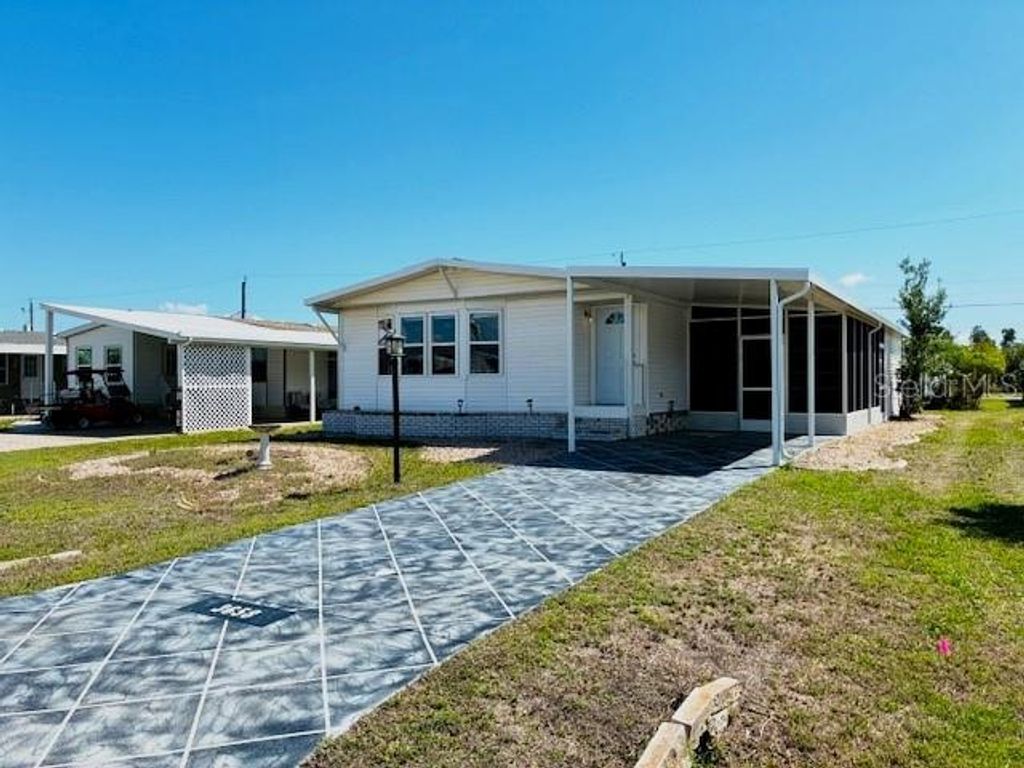 Photo of 3658 Stockton Road, Port Charlotte, FL 33953 (MLS # C7523207)