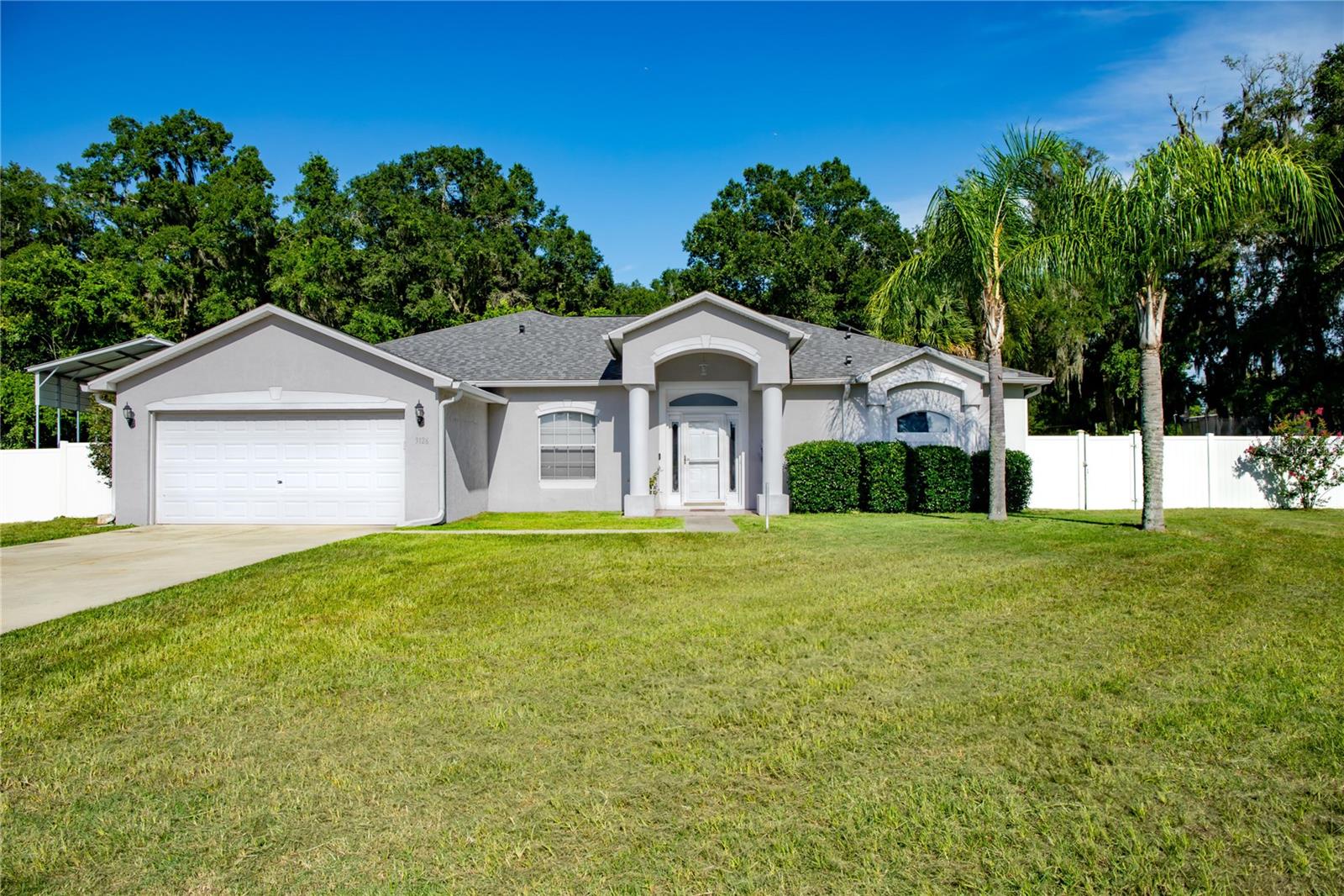 Welcome to this charming Ocala home featuring 4 bedrooms and 2 bathrooms. This floor plan has two living areas, a split floor plan, and a flex room that can be either an office or an additional bedroom. The master suite is spacious and has a luxurious master bath with double vanities, garden tub and tons of closet space. This home has recently been updated with a few modern touches as well as solar system (2020), new roof (2023), HVAC (2024), and a water treatment system (2024). Walk into this kitchen and picture yourself cooking an evening meal or hosting large family gatherings, there is plenty of room! Did we mention the back yard? So much space for a multitude of hobbies to include an enclosed shop, boat or RV storage. This home checks off so many boxes, it is a must see!