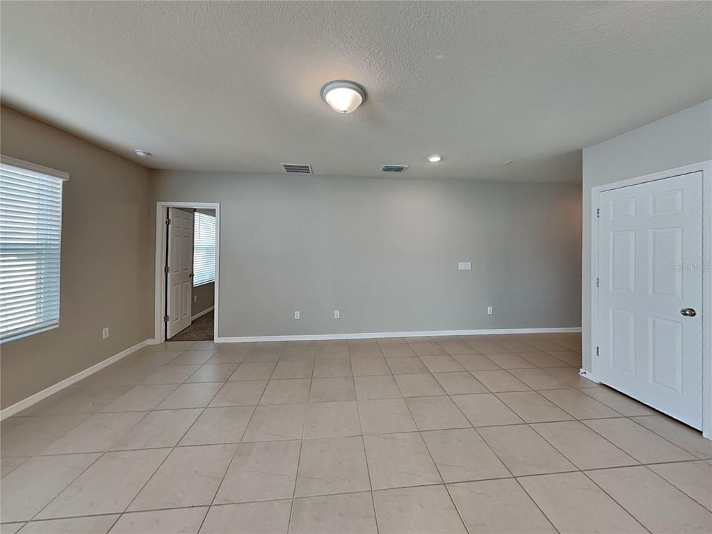 Photo of 1151 Sugarwood Street, Davenport, FL 33837 (MLS # TB8470326)