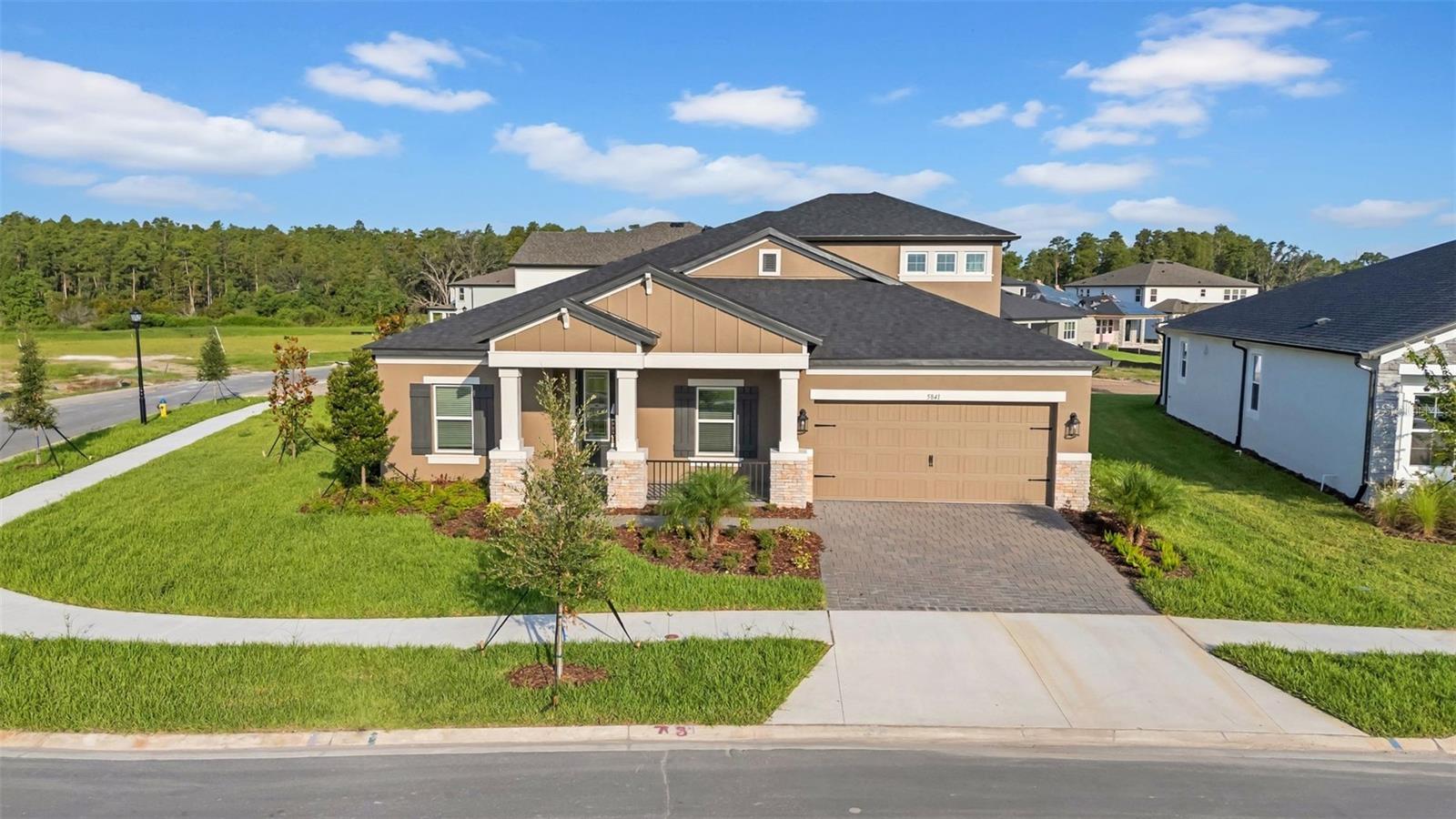 Newly constructed Roxbury (Elevation E) floorplan in Chapel Crossings—popular, spacious, and thoughtfully designed. Situated in a peaceful neighborhood, this fantastic 1-story layout features a large bonus room upstairs. With over 3,500 square feet, there's plenty of room for both living and entertaining.
This home boasts a unique layout, showcasing modern design elements and quality craftsmanship throughout, constructed by M/I Homes.
Upon entering the foyer, you'll notice an archway leading into a den. The first archway opens to a split hallway with a bedroom on either side, as well as a full bathroom in between. Across the hall from the bedrooms and bathroom, another archway leads to a hallway with a second full bathroom, a laundry room, an additional bedroom, and access to the garage. Just past this hallway on the right are stairs leading up to the enormous bonus room, complete with its own bathroom! This space is perfect for entertaining or simply as a private getaway within this spectacular home.
Returning downstairs, you'll enter the dining room, which flows seamlessly into the large family room. Just off the family room is a cozy café space that includes sliding glass doors leading out to the patio. Adjacent to the café is the stunning kitchen—complete with an island and a corner pantry with a glass door. This gourmet kitchen offers sleek countertops, state-of-the-art appliances, and ample cabinet storage to meet all your culinary needs.
From the family room, walk through an archway and a door into the amazing owner’s deluxe suite featuring a tray ceiling, abundant windows, a study area, sitting space, and walk-in closets, this is the ideal retreat. French doors lead into the owner’s bathroom, which includes dual vanities, a garden tub, and a stand-up shower—offering luxurious finishes and spa-like features to help you unwind.
The screened lanai is perfect for entertaining guests or simply relaxing in the fresh air. Whether you're hosting a barbecue or enjoying your morning coffee, you'll love the possibilities this space offers. You won’t believe how much space this home has until you see it for yourself.
Chapel Crossings is a master-planned community comprised of several neighborhoods and home types, surrounded by nature-filled parks, ponds, and amazing resort-style amenities - including a clubhouse, fitness center, dog park, pool with beach entry, and a lazy river.
This growing area features excellent schools and is close to the shopping and dining options at Tampa Premium Outlets, The Grove, KRATE, and The Shops at Wiregrass. Located approximately 35 minutes north of Downtown Tampa, 45 minutes from Tampa International Airport, and just over an hour from Disney World in Orlando.