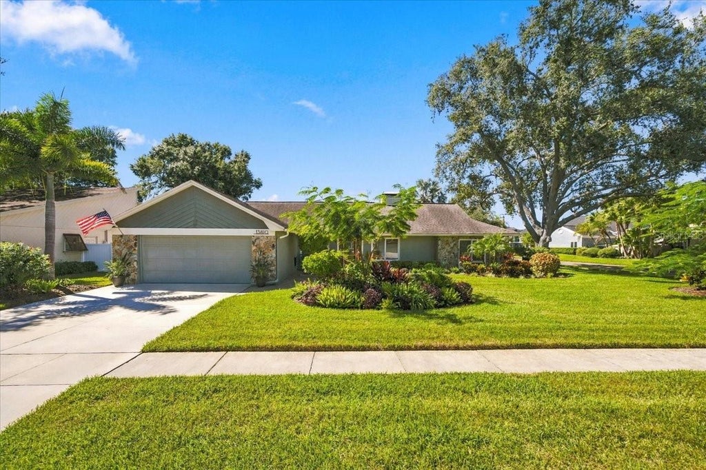 Photo of 13810 Lake Village Place, Tampa, FL 33618 (MLS # TB8560160)