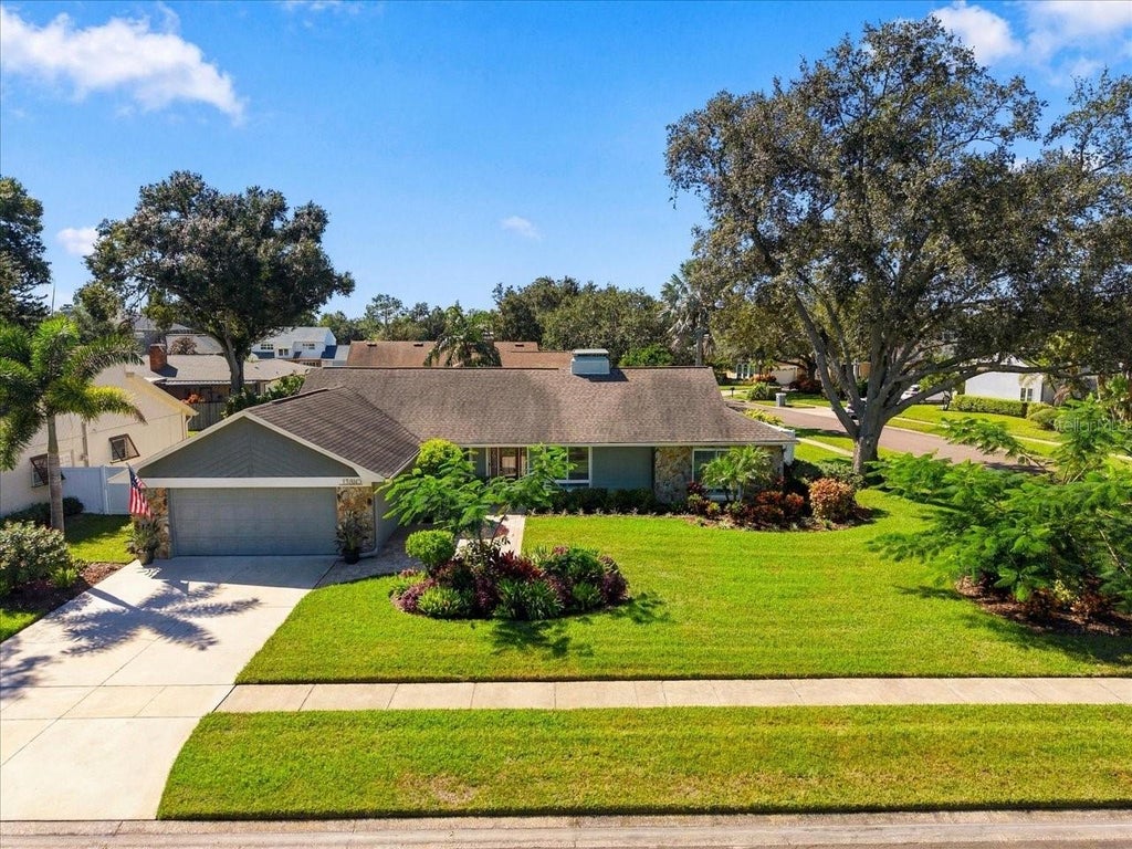 Photo of 13810 Lake Village Place, Tampa, FL 33618 (MLS # TB8560160)