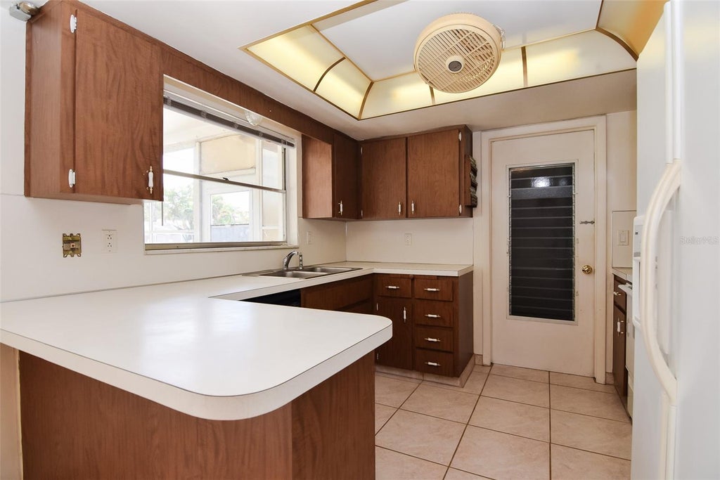 Photo of 13594 Monalee Avenue, Seminole, FL 33776 (MLS # TB8553198)