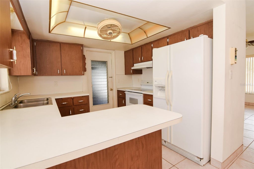 Photo of 13594 Monalee Avenue, Seminole, FL 33776 (MLS # TB8553198)