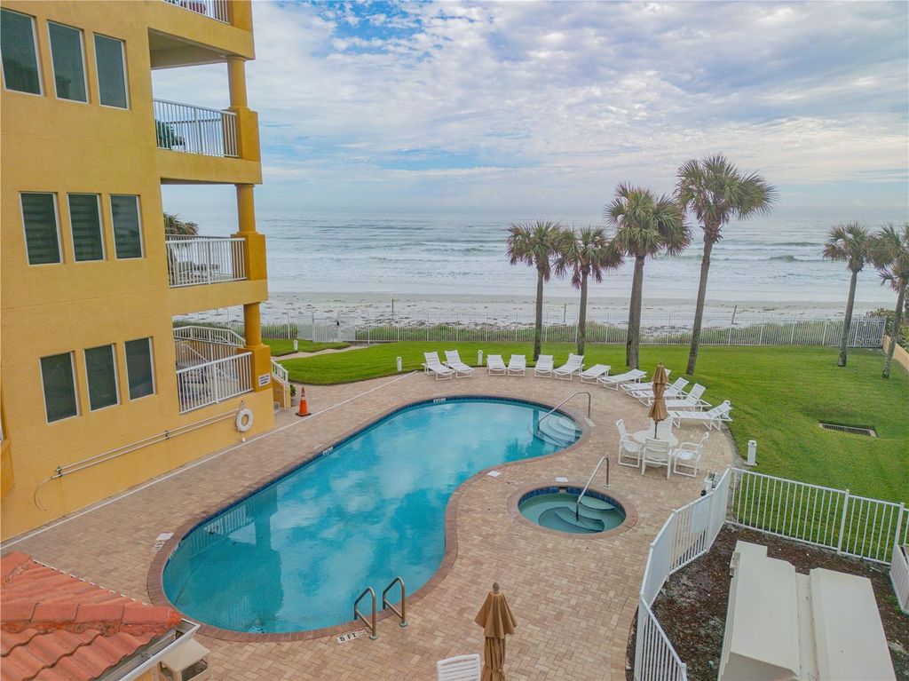 Photo of 701 N Atlantic Avenue #203, New Smyrna Beach, FL 32169 (MLS # NS1087935)