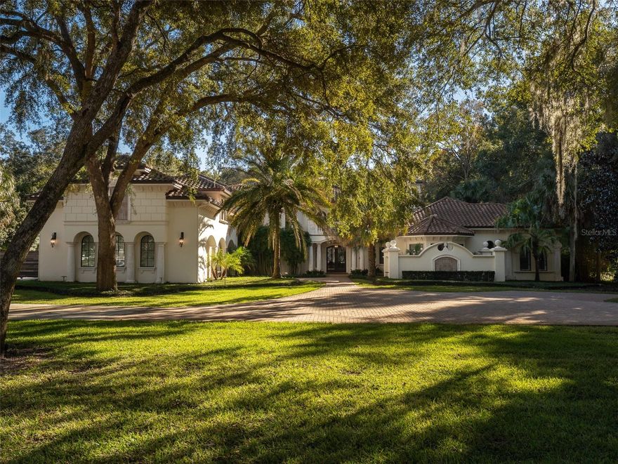 Exquisite Gated Biltmore Estate (more photos coming soon!). The pictures do not do justice to this back yard oasis and playground. Nestled on a private, lush 2-acre homesite within the prestigious gated Biltmore Subdivision, this magnificent 13,123 total square-foot residence (9,177 sf primary living area) exemplifies luxury living at its finest. Impeccable craftsmanship, cutting-edge smart home technology, and resort-style outdoor living combine to create an unparalleled legacy property. Step inside to soaring ceilings, expansive entertaining spaces, and a seamless indoor-outdoor flow. The home is fully equipped with automated lighting, distributed audio, and whole-house control systems that put effortless sophistication at your fingertips. Highlights: Living Area-Grand formal dining room, seating for 10+, Stunning lounge with full bar, State-of-the-art home theatre, Dedicated home gym, Two private studies/offices, Gourmet chef's kitchen with professional-grade appliances and oversized island. Bedrooms-Opulent owner's suite-enormous master suite with fireplace, spa-inspired bath, dual expansive closets, and private outdoor shower, Four additional ensuite bedrooms, each with luxurious finishes. Entertainment-Expansive game room/secondary family room with adjoining theatre, Multiple covered terraces, Sophisticated HVAC systems with pressurization to provide for indoor-outdoor flow, Leave doors open all day to enjoy the outdoor spaces. Outdoor Oasis-Manicured grounds offering complete privacy, Resort-worthy pool & spa, Outdoor kitchen and multiple seating areas perfect for lavish gatherings, Lush landscaping with mature trees and dramatic night lighting, Enjoy the basketball/pickleball mini court, putting green, and sizable outdoor fire pit. Additional features-6 full & 2 half baths, 2,911 sf of garage and covered porch space (room for 4+ cars, plus a parking court for 6 vehicles), 1,035 sf of auxiliary heated/cooled flex space, Elevator-ready shaft, Generator, Unmatched attention to detail throughout. Pool Cabana offers a full bath, storage room, and commercial ice machine. Access the parking court and fully fenced backyard via private electric gated entry. This rare offering delivers the privacy of an exclusive estate with the security and prestige of a gated neighborhood. A true masterpiece designed for the most discerning buyer seeking space, sophistication, and modern automation in one of Gainesville's most coveted enclaves. *Note-Owners hold real estate licenses.