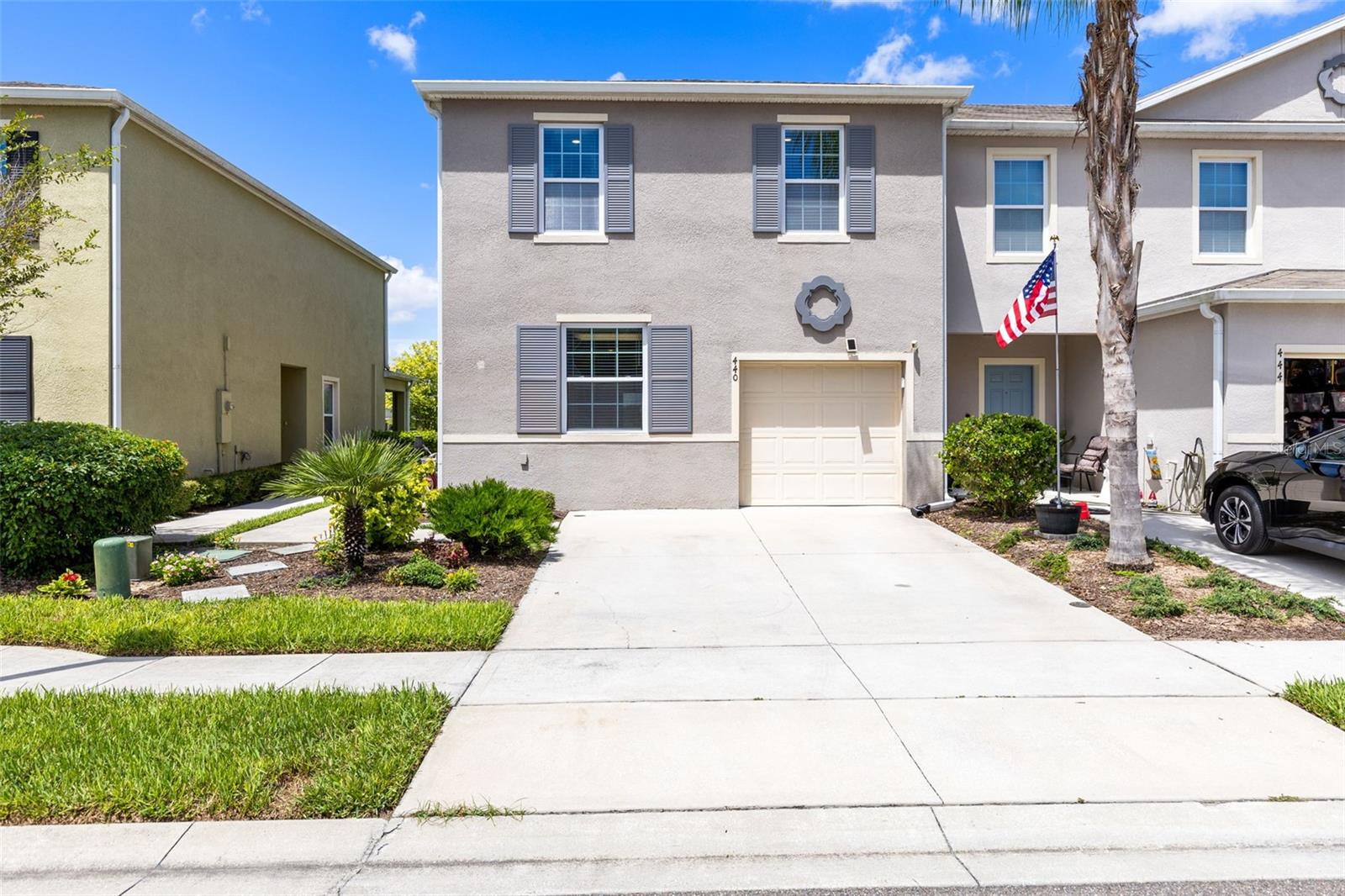 WELCOME HOME to this resort style, sunny END-UNIT townhome that OVERLOOKS A TRANQUIL WATER VIEW of Lake Bluff from your very own, PRIVATE SCREENED-IN PATIO. As you walk up your PRIVATE SIDEWALK with individual entry, step inside to this freshly painted spacious residence that offers over 1,700 sq ft of open living space with a bright and airy layout. The kitchen features quartz countertops and a breakfast bar, flowing seamlessly into the living and dining areas with ample space for lounging and entertaining guests. Also, downstairs is a conveniently located powder bath. As you make it upstairs, there is a loft space separating the bedrooms, perfect for an office or extra hangout area. The primary suite features a WALK-IN CLOSET and private bath complete with dual sinks. The two additional bedrooms upstairs share their own dedicated full bathroom. Enjoy maintenance-free living with a LOW HOA which includes a resort-style community pool and exterior lawn maintenance. Convenient access to Reunion, Champions Gate, 1-4, short drive to Disney and so many wonderful area attractions, dining, major highways, and shopping are all at your fingertips! Don't miss your chance to live in this peaceful, centrally located community.